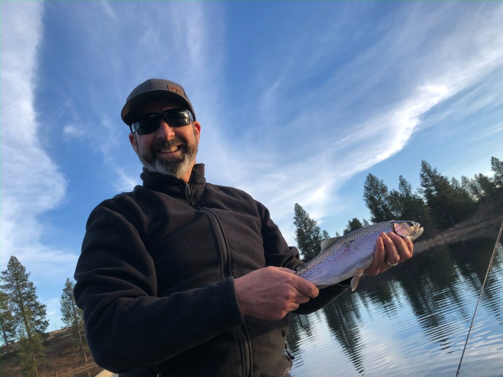 Paul Harrington holding a fish.